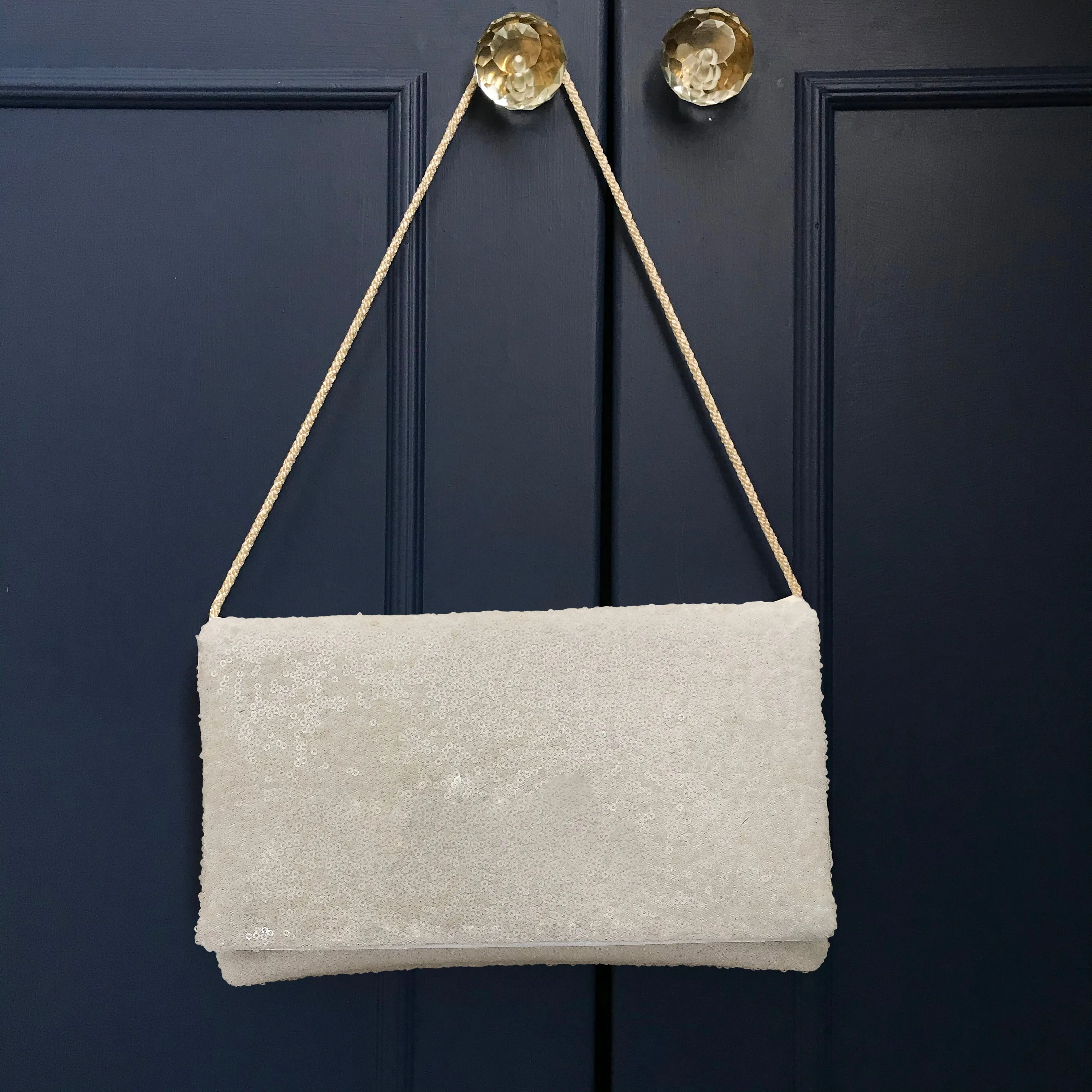 Ivory sequin plain clutch handbag